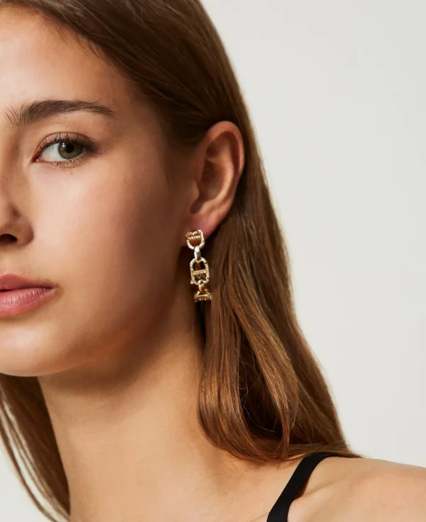 boucles_doreilles_avec_ch_1.webp Bijoux*TWINSET Milano Boucles D’oreilles Avec Chaîne Oval T Et Strass New Gold