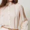ceinture_fine_rversible_e_1.webp Ceintures*TWINSET Milano Ceinture Fine Réversible En Cuir Avec Oval T Bicolore Rose « Peach Pink »/Marron « Sandy Brown »