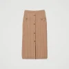 jupe_milongue_ajuste_en_m_1.webp Jupes*TWINSET Milano Jupe Mi-longue Ajustée En Maille Avec Boutons Marron « Sandy Brown »