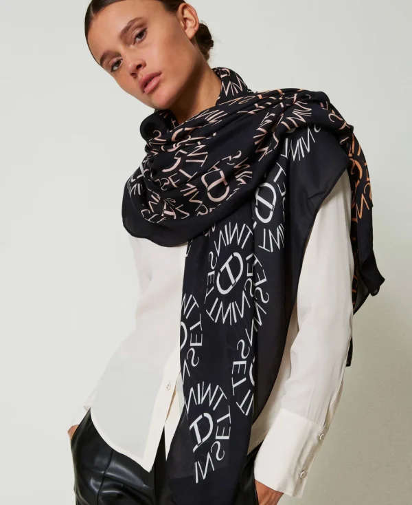 keffieh_avec_imprim_oval__1.webp Écharpes*TWINSET Milano Keffieh Avec Imprimé Oval T Et Logo Imprimé Multicolore Oval T Noir