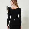 minijupe_en_maille_avec_v_3.webp Jupes*TWINSET Milano Mini-jupe En Maille Avec Volants En Tulle Noir