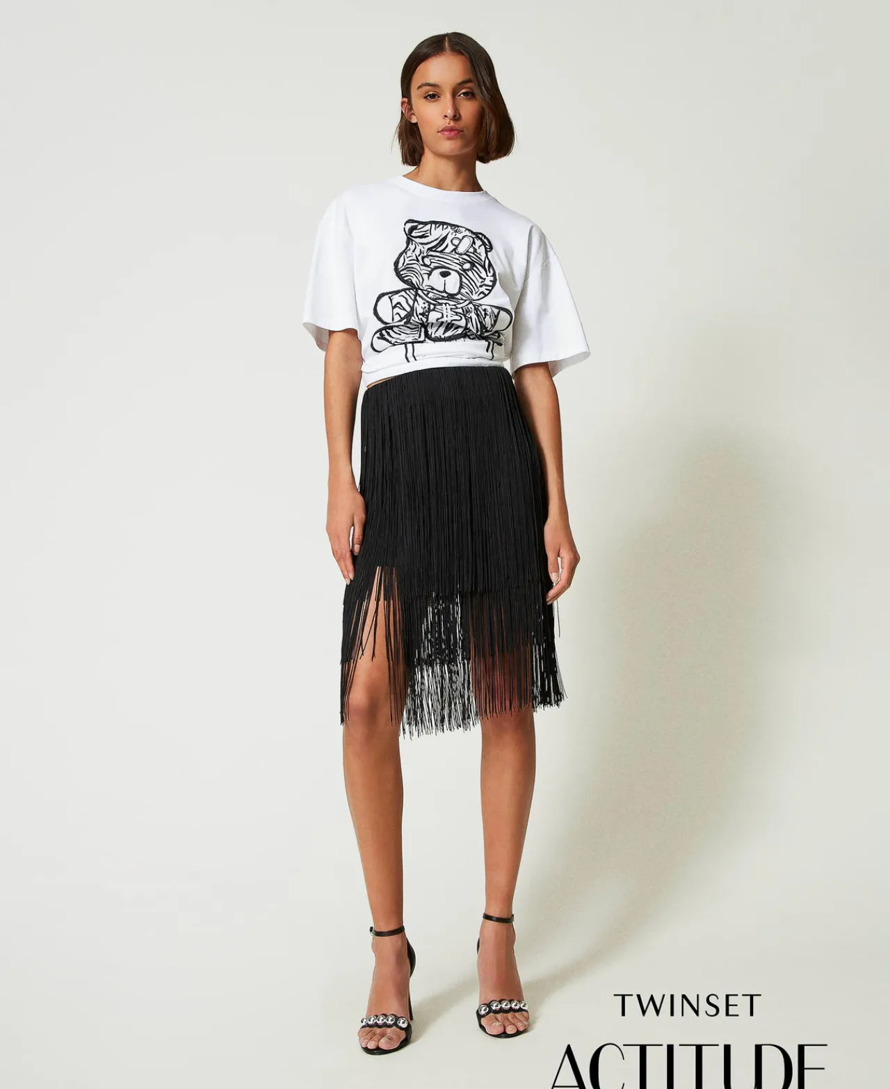 minijupe_myfo_avec_frange_0.webp Jupes*TWINSET Milano Mini-jupe MYFO Avec Franges Noir