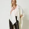 poncho_en_maille_avec_bro_0-1.webp Ponchos*TWINSET Milano Poncho En Maille Avec Broderies Crème White
