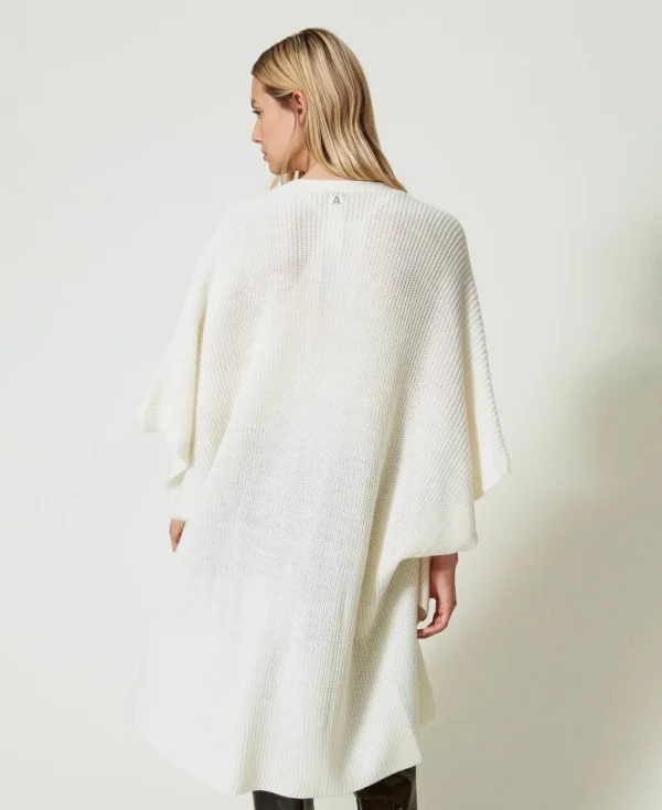 poncho_en_maille_avec_bro_3-1.webp Ponchos*TWINSET Milano Poncho En Maille Avec Broderies Crème White