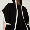 poncho_en_maille_avec_poc_0.webp Ponchos*TWINSET Milano Poncho En Maille Avec Poches Noir