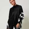 poncho_en_maille_jacquard_0.webp Ponchos*TWINSET Milano Poncho En Maille Jacquard Avec Logo Noir